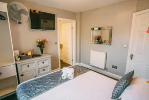 OYO Minerva Guesthouse - Quarto