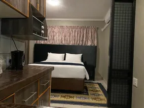 PW Heights Private Guest House - Habitación