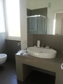 Up Room & Suite - Badezimmer