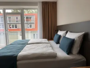 Hotel Schöne Aussicht, Stilvoll modern, direkt am Rüstersieler Hafen - Chambre