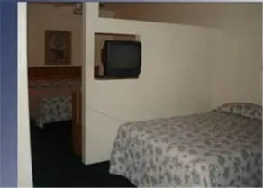 Colonade Motel Suites - Chambre