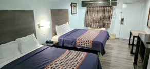 Scottish Inns and Suites East Sam Houston Pkwy - Chambre