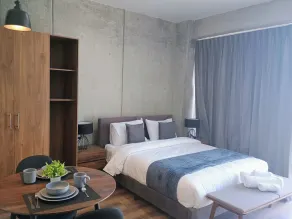 Suites del Carmen Consulado - Room