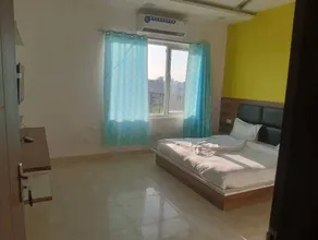 Treebo Chanakya Palm - Chambre