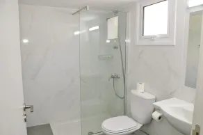 Kaos Hotel Apartments - Badezimmer