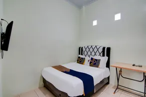 Hotel O Awi Stay Syariah Near SIMPANG KAWASAN INDUSTRI WILMAR PELINTUNG - Habitación