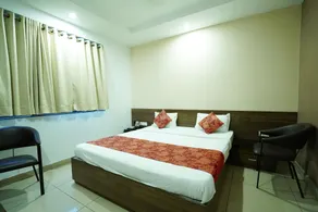 Townhouse Nagpur Airport Formerly Flora Inn - Habitación