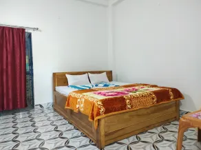 Homecation Manas River Rock Lodge - Room