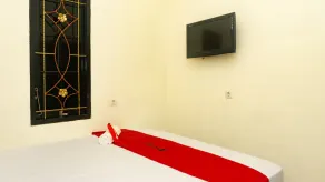 RedDoorz near Sentani Airport Jayapura - Chambre