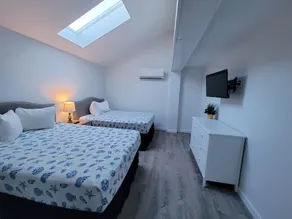 The Grand Beach Inn - Chambre