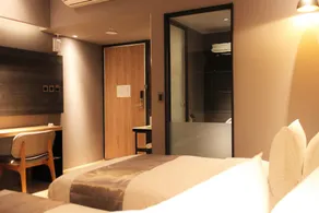 Sunrise Hotel - Værelse