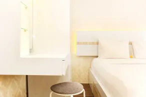 Comfort Living 1BR at Grand Sentraland Karawang Apartment By Travelio - Room