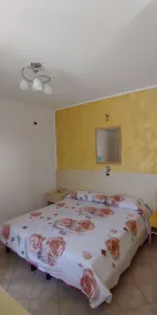 Familienorientierte Ferienwohnung mit Garten | Gartenblick - Zimmer