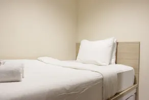 Best Location 2BR Tamansari La Grande Apartment By Travelio - Zimmer