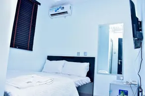 Thrivemax Hotel and Suites - Zimmer