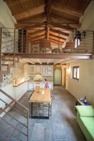 Charming Alessandria Apartment with Shared Pool & City Views - Living room