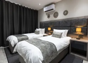 Luxe Suites Boutique Hotel - Zimmer