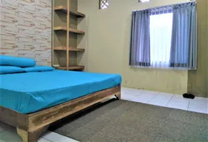 Penginapan Rudi Syariah - Habitación