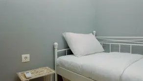 Classy 2BR Apartment at Menteng Park with City View By Travelio - Værelse