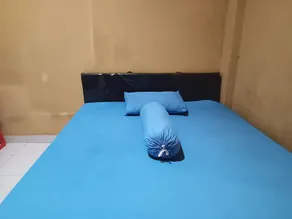 OYO 93073 Penginapan 69 - Chambre