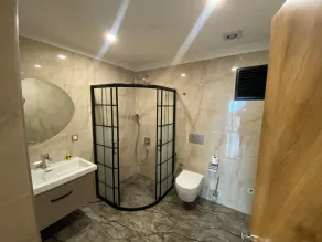 Rena Grand Residence & Suit - Bathroom