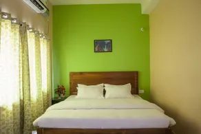 Rains Inn Eco Hotel - Chambre