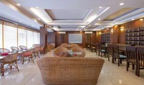 Treebo Premium Grand Legacy Elite with Roof Top Cafe - Restaurant
