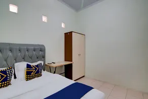 Hotel O Awi Stay Syariah Near SIMPANG KAWASAN INDUSTRI WILMAR PELINTUNG - Habitación