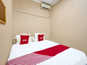 OYO 91846 Ms Rini Homestay Syariah - Chambre