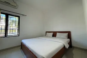 Hotel O Ezhar Boka Homestay Near GOR Sulis Bulutangkis - Chambre