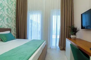 Toto Hotel & Apartments - Chambre