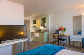 Astelia Apartment Hotel - Chambre
