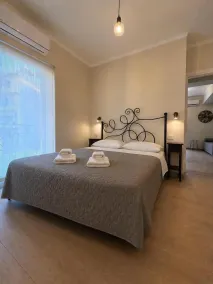 Angelland Luxury Suites - Chambre