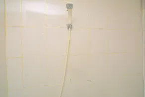 Bassura City 2BR Apartment with Minimalist Design near Shopping Mall - Baño