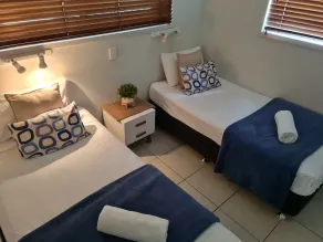 Cranbourne Court Beachside Apartments - Habitación