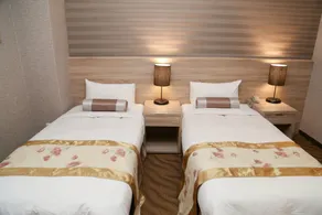 Unique Hotel - Chambre