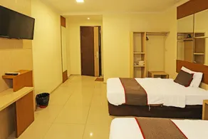 Super OYO Townhouse OAK Hotel Fiducia Serpong - Værelse