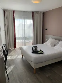 Hôtel Au Relais des Lilas - Rom