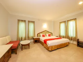 OYO 89679 Dream Garden Resort - Habitación