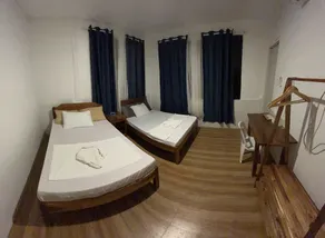 Hill Myna Beach Cottages - Chambre