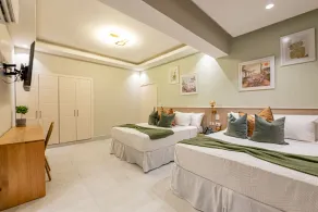 Hotel Stay Here Suites - Room