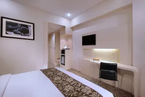 Quest San Denpasar by ASTON - Room