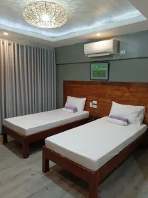 Norlu Cedec Midpoint Hotel - Chambre