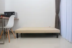Modern 1BR at Ciputra World 2 Apartment By Travelio - Zimmer