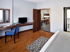 Mövenpick Hotel Apartments Al Mamzar Dubai - Chambre