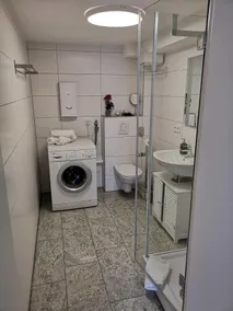 Hochmoderne Apartments - Badezimmer