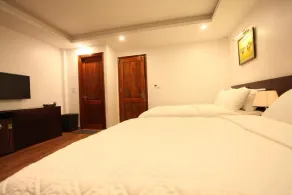 Camellia Hotel - Zimmer
