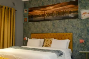 Room 1 of 8 Cozy Suites at The Hilltop Guesthouse - Zimmer