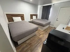 Best Budget Inn - Quarto