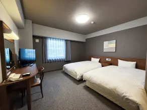 Hotel Route-Inn Omagari Ekimae - Zimmer